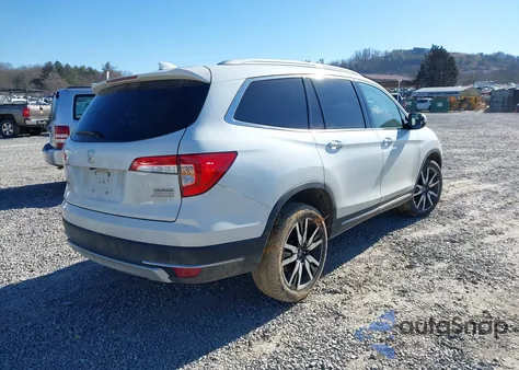 2021 Honda Pilot Awd Touring 7 Passenger z USA, uszkodzony, nr VIN 5FNYF6H65MB091805